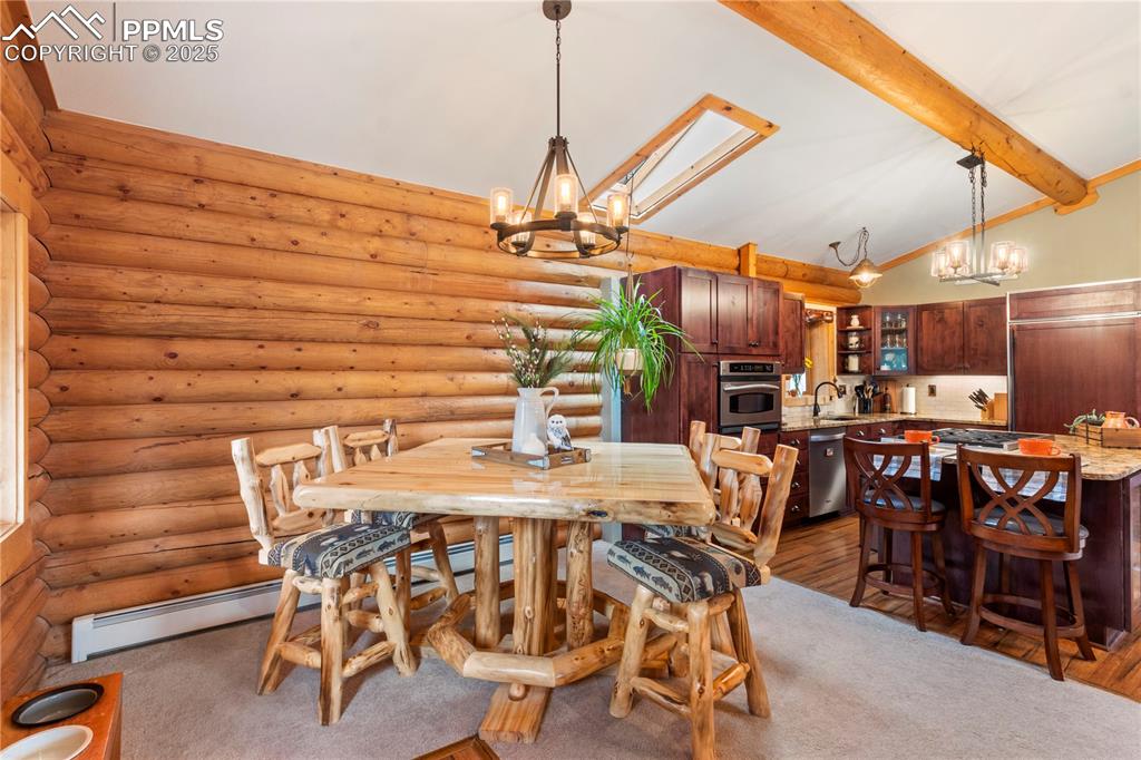 Image 6 of 46: Open concept dining/kitchen