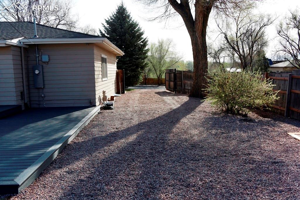 Image 28 of 41: Gate from inside yard