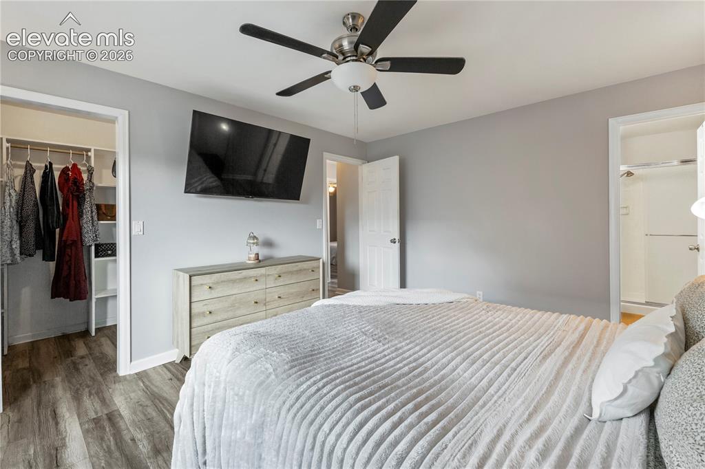 Image 13 of 20: Walk in closet off of primary bedroom