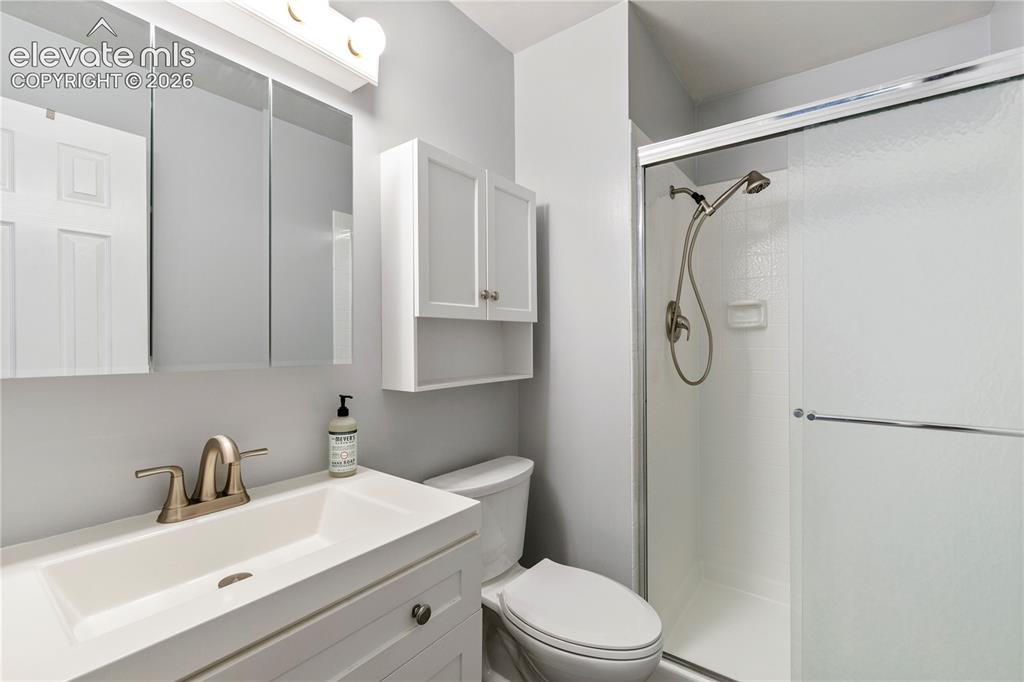 Image 16 of 20: 3/4 attached primary bathroom