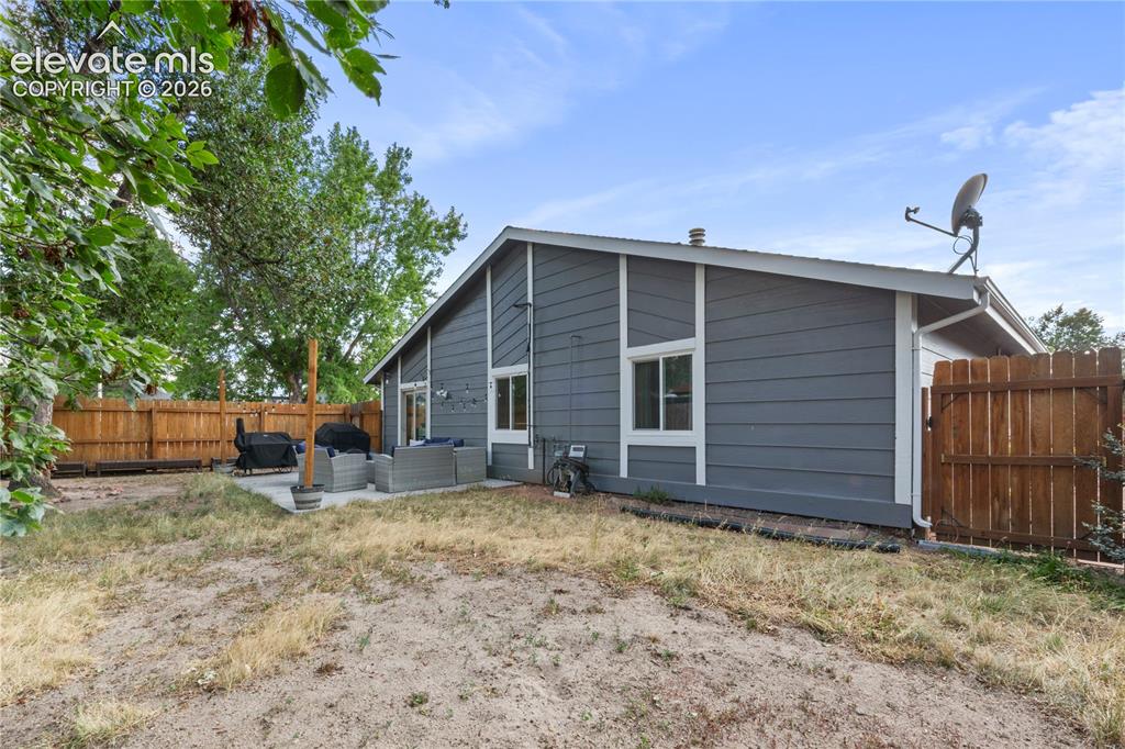 Image 20 of 20: Large fenced backyard