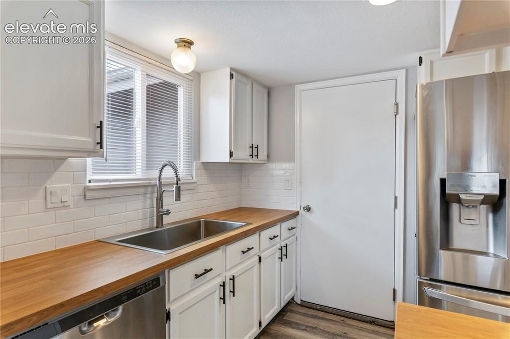 Image 9 of 20: Another view of kitchen