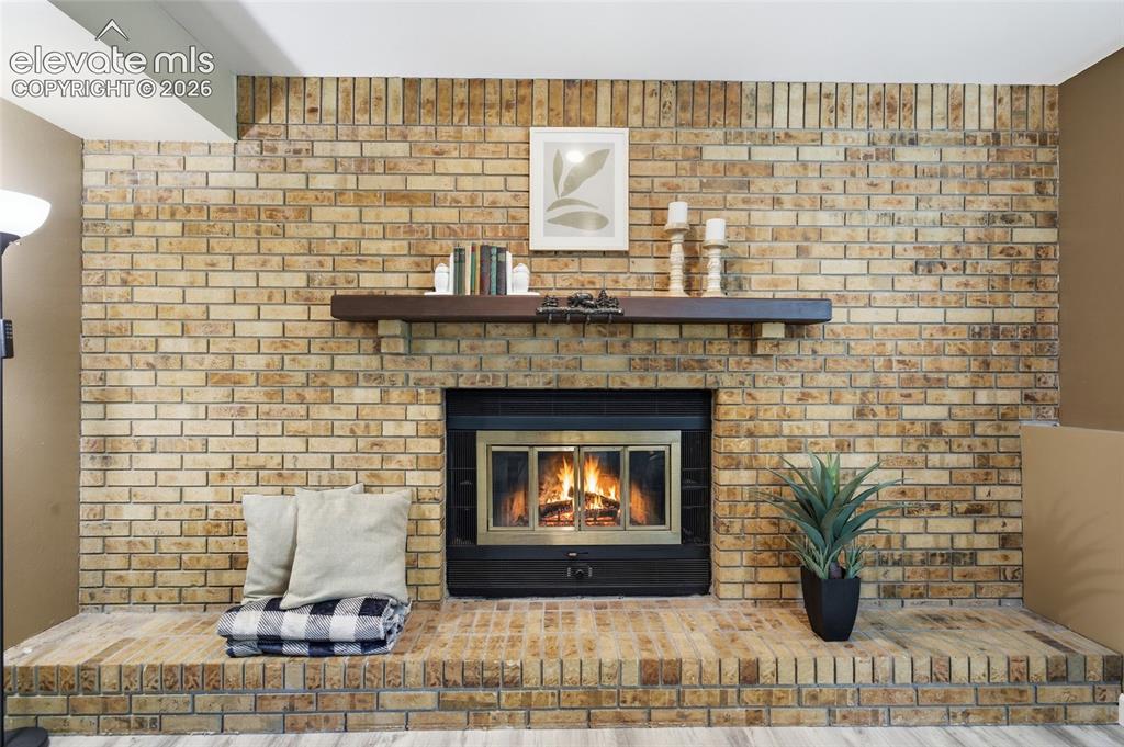 Image 11 of 50: Fireplace
