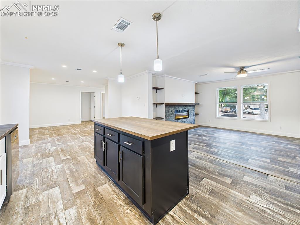 Image 16 of 50: Flows seamlessly into the kitchen and great room for easy entertaining.