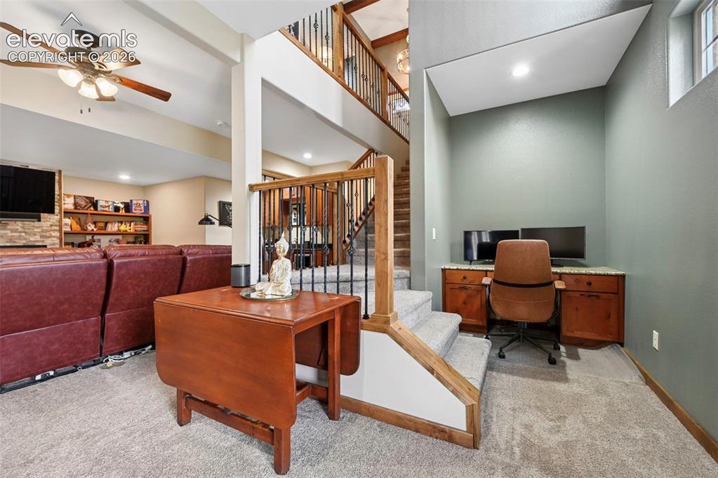 Image 23 of 48: Basement with Built-In Office Space