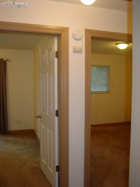 Image 13 of 16: 2002 Hallway to bath and bedrooms