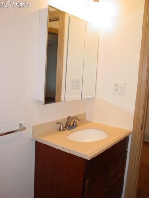 Image 15 of 16: 2002 Bathroom featuring vanity
