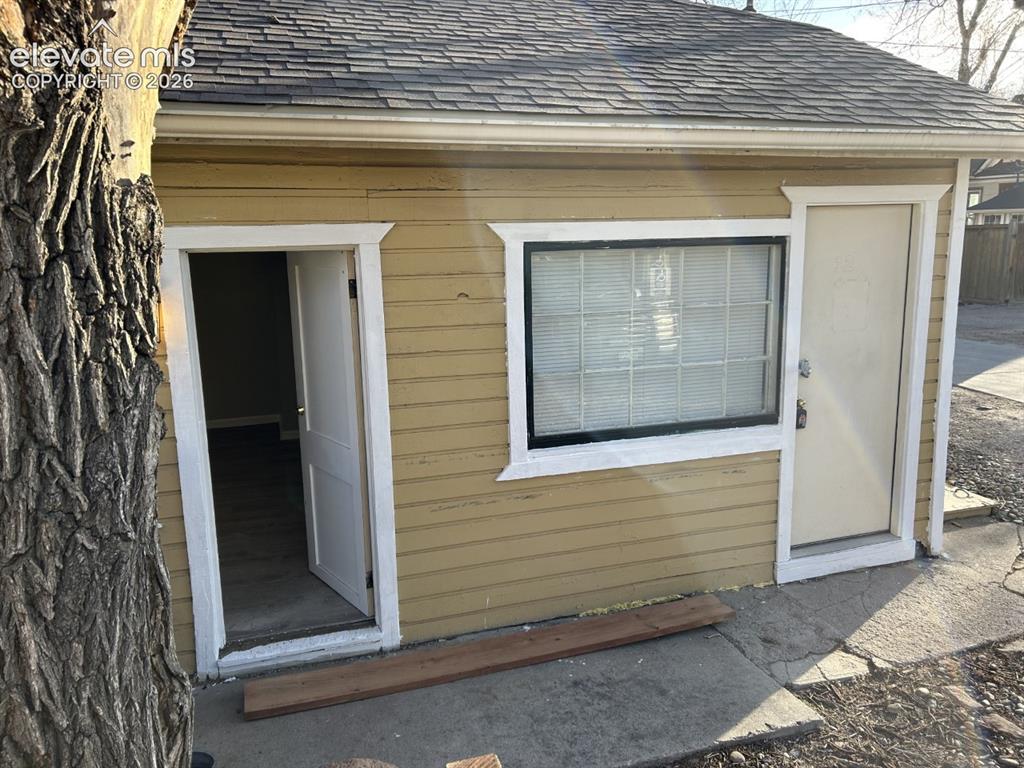 Image 2 of 45: back cottage 812 1/2 one bed one full bath. full kitchen
