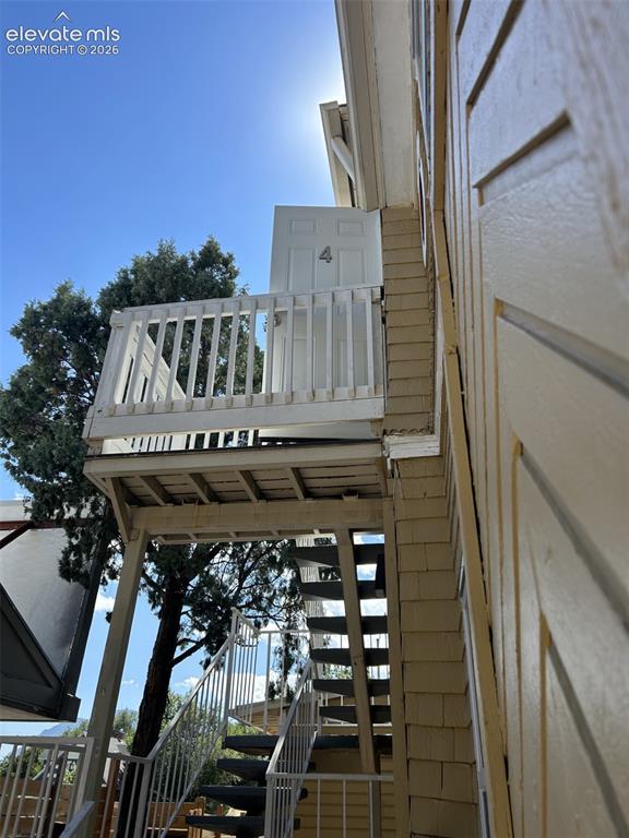 Image 33 of 45: Exterior balcony with white railing