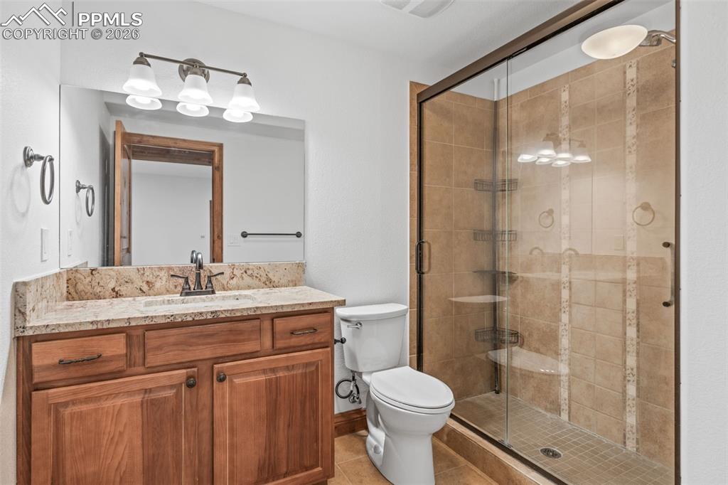 Image 38 of 50: Bedroom 2 with private vanity Bathroom adjoins