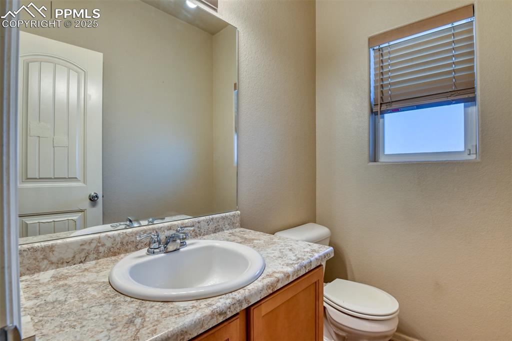 Image 10 of 28: 1/2 bathroom on main level