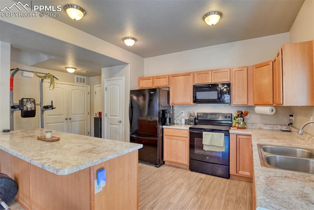 Image 7 of 28: Kitchen with lots of cabinets, separate pantry and plenty of counter space