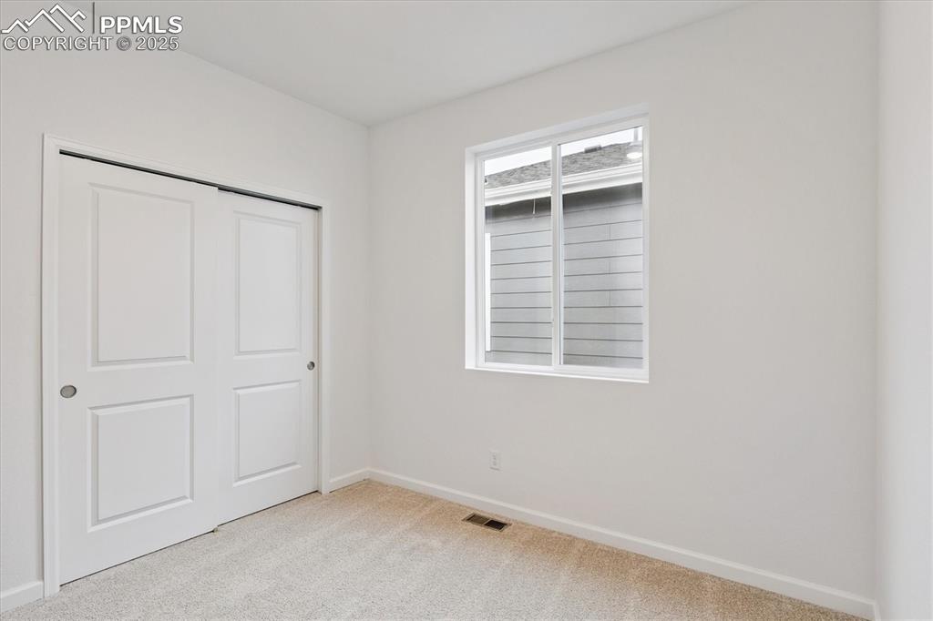 Image 13 of 20: Bedroom