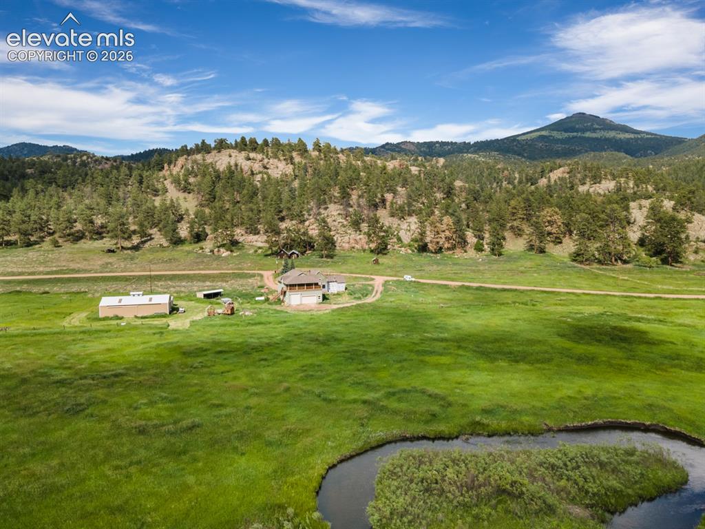 Image 44 of 45: Aerial view, Mountain view, Grassy Lands, Landscape, Water Front