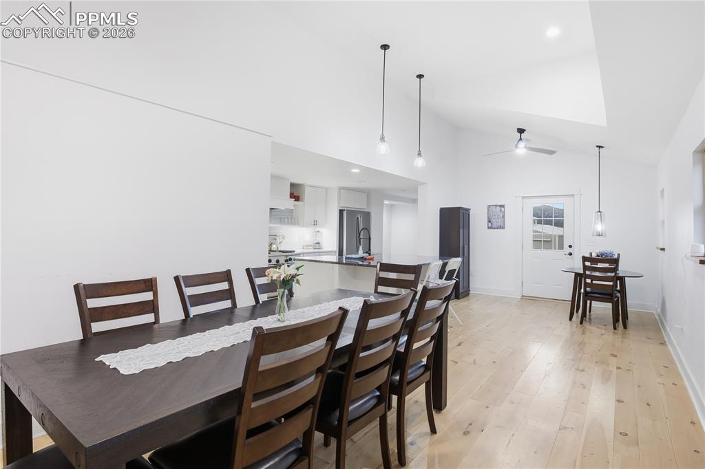 Image 9 of 45: Dining and Beautiful Kitchen off of the Living