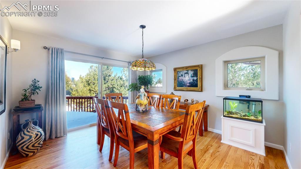 Image 6 of 34: Dining space with healthy amount of natural light, light wood-style floors,