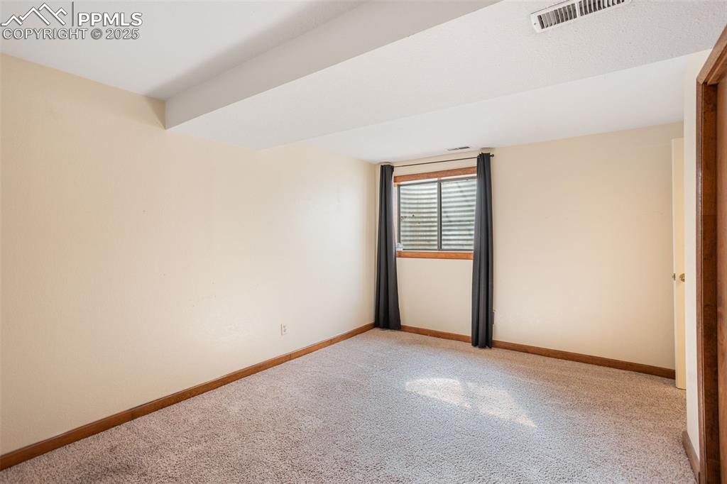 Image 22 of 35: Bedroom