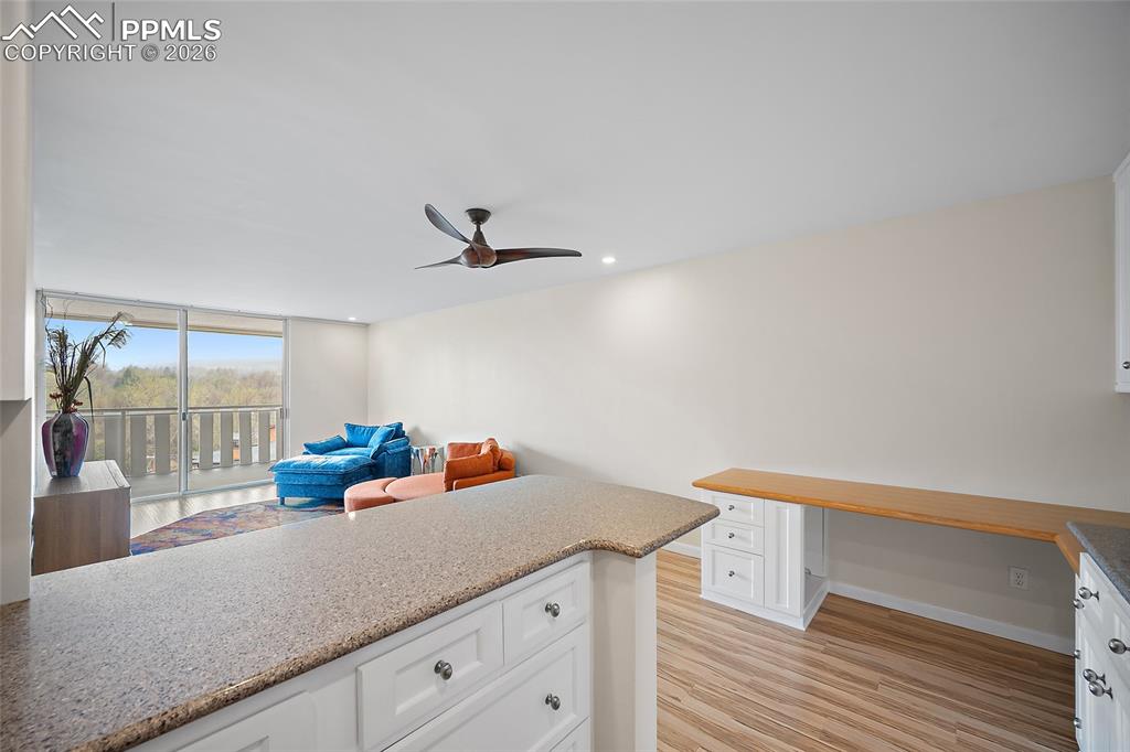 Image 15 of 41: Kitchen and Living Room