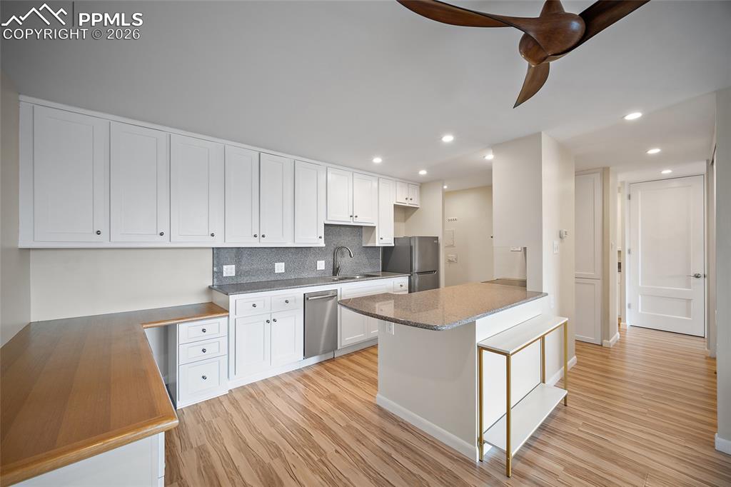 Image 2 of 41: Kitchen and Built-in Desk 