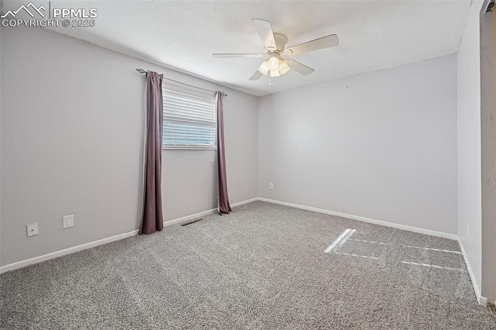 Image 11 of 25: Upstairs bedroom