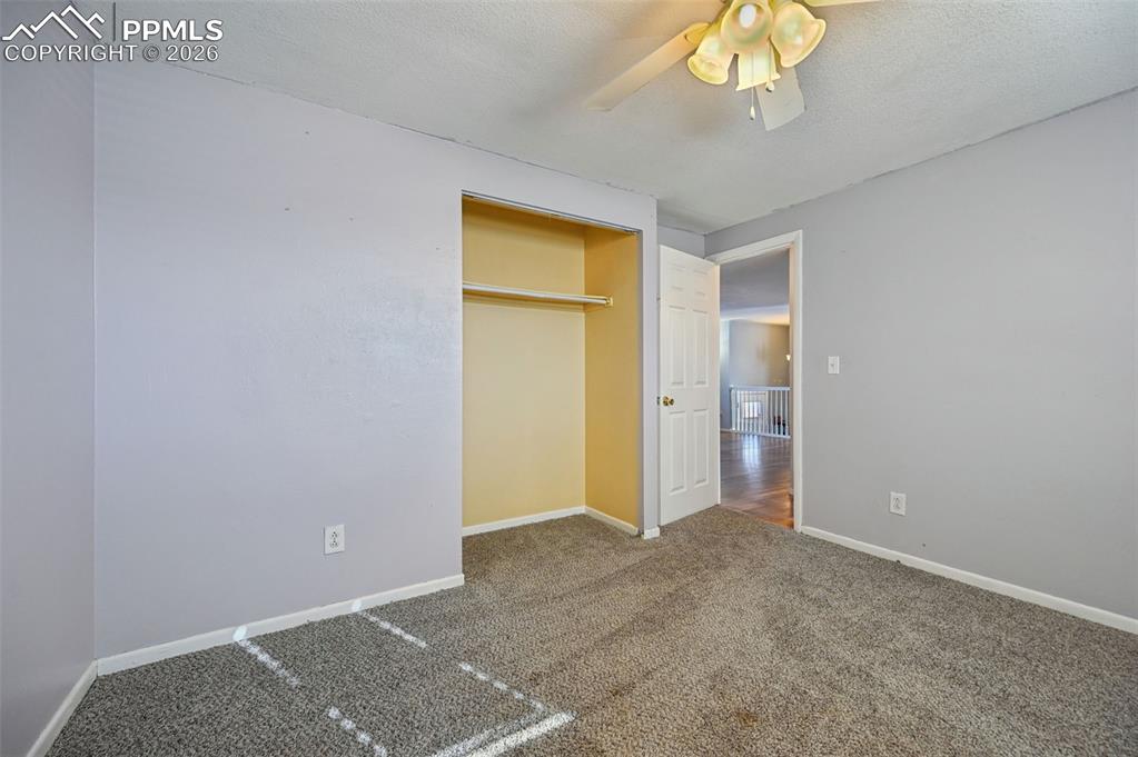 Image 12 of 25: Upstairs bedroom