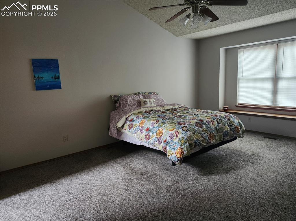 Image 13 of 19: Bedroom