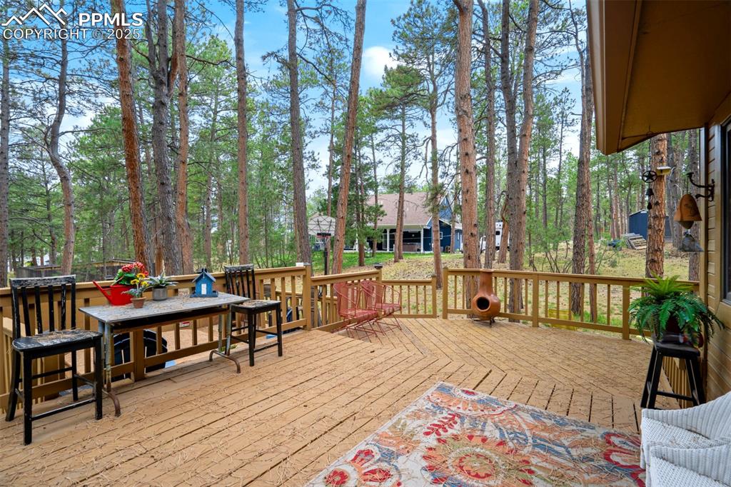 Image 9 of 48: Deck with outdoor dining space