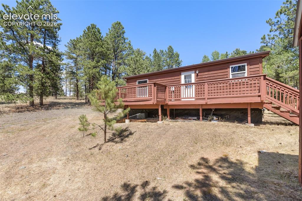Image 21 of 22: Back of Property and full deck!