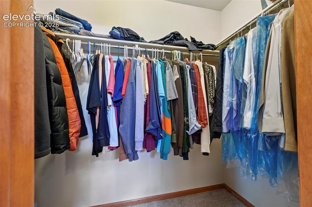 Image 27 of 32: Primary closet