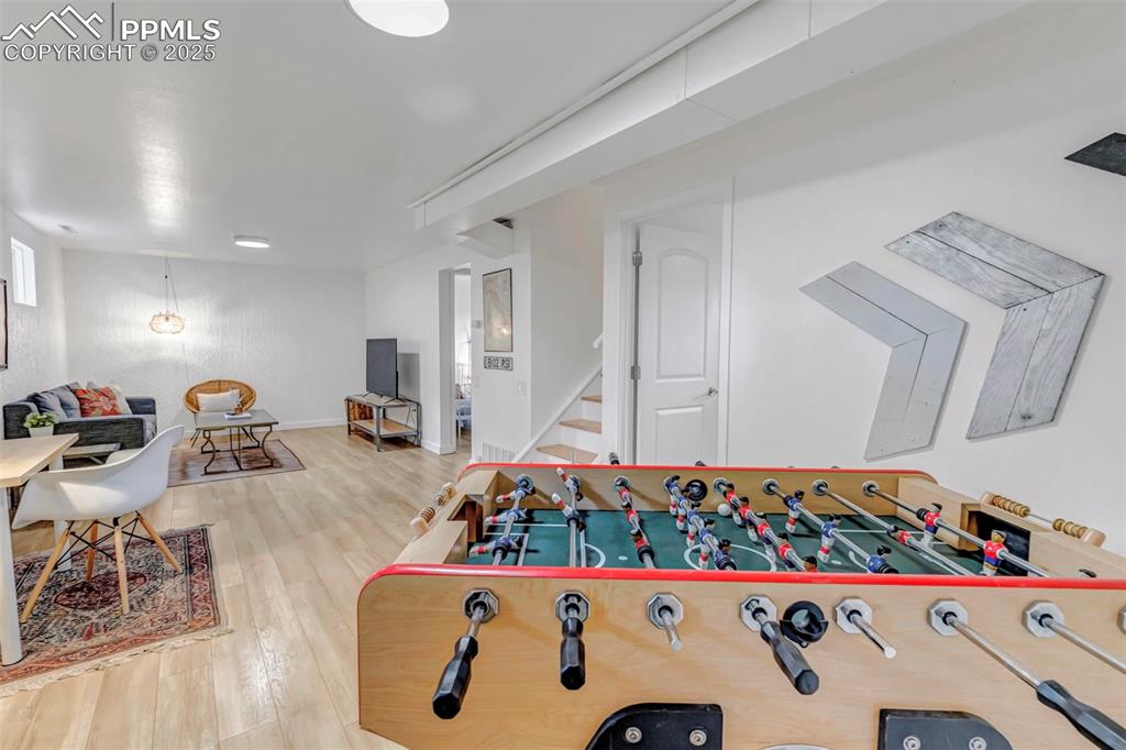 Image 21 of 35: Large secondary living room in basement