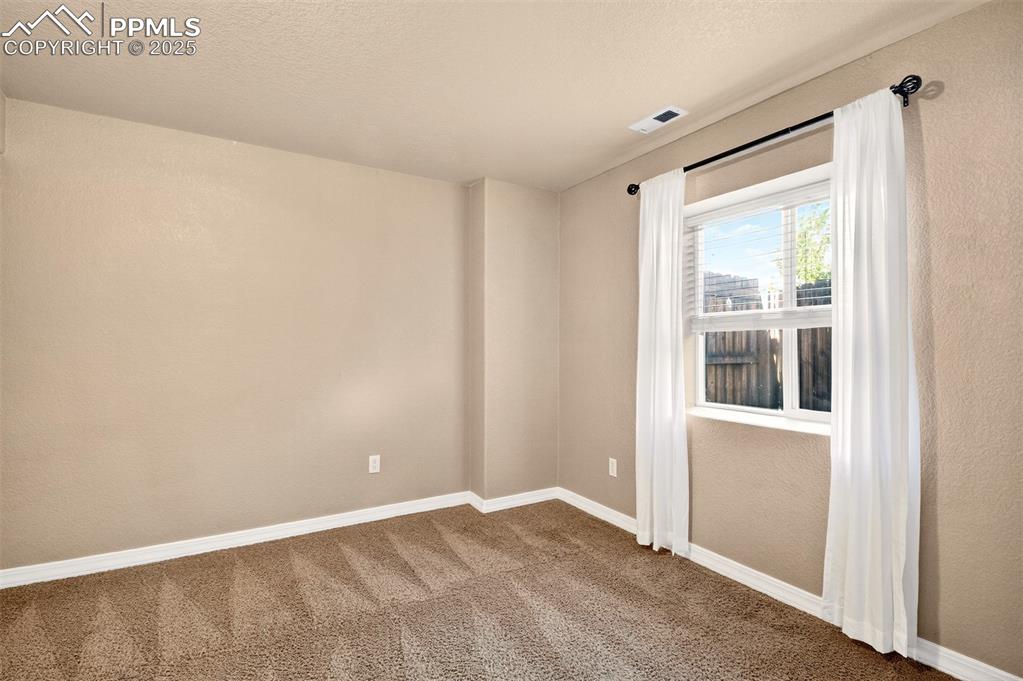 Image 22 of 35: Bedroom