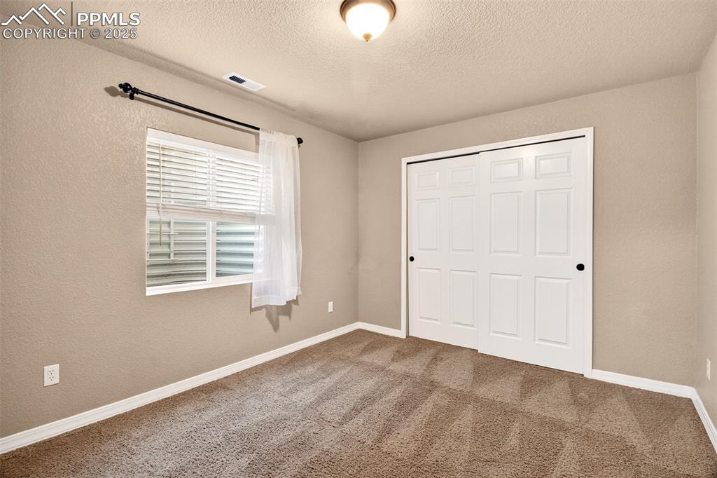 Image 25 of 35: Bedroom