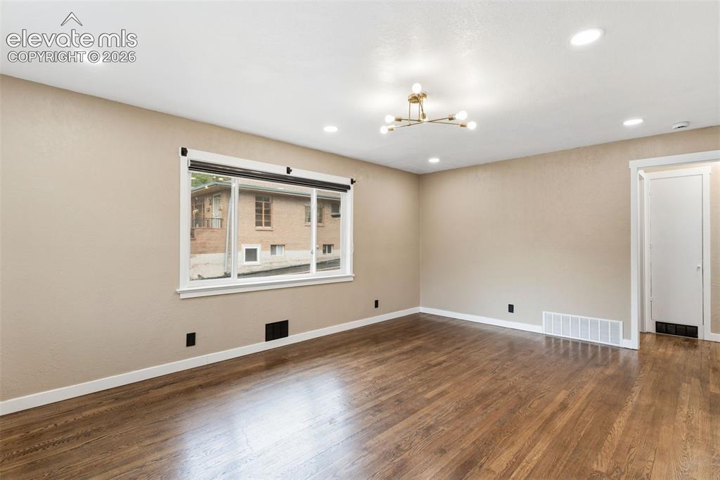 Image 10 of 38: Unit # 1 Family Room
