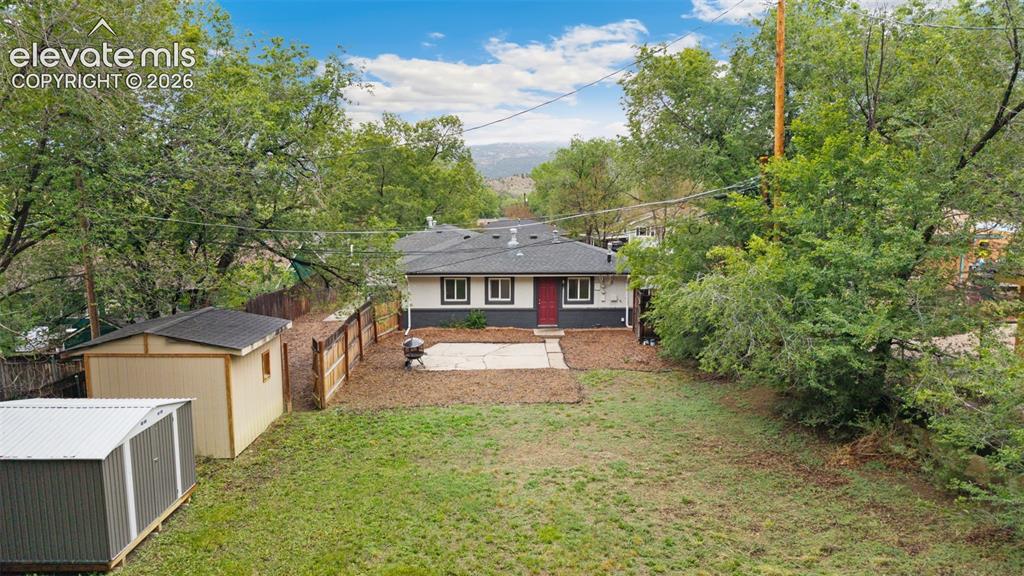 Image 33 of 38: Each unit has own storage shed and privately fenced backyard space