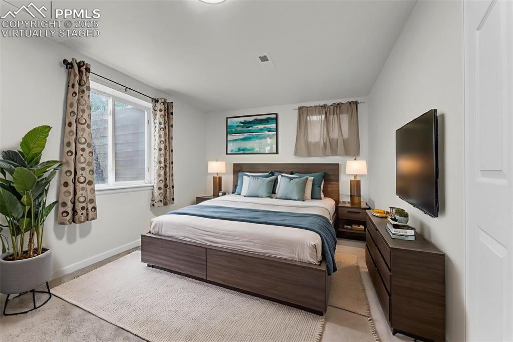Image 17 of 38: Virtually Staged. Basement Level: Bedroom #3
