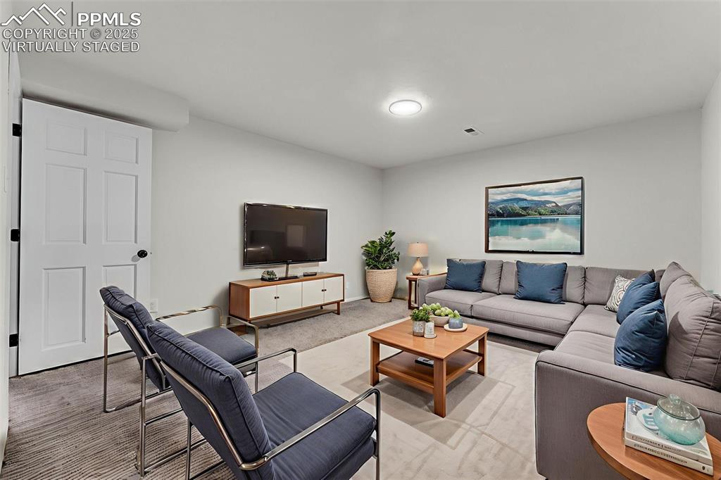 Image 23 of 38: Virtually Staged. Basement Level: Oversized Family Room / Flex Room ; Endle