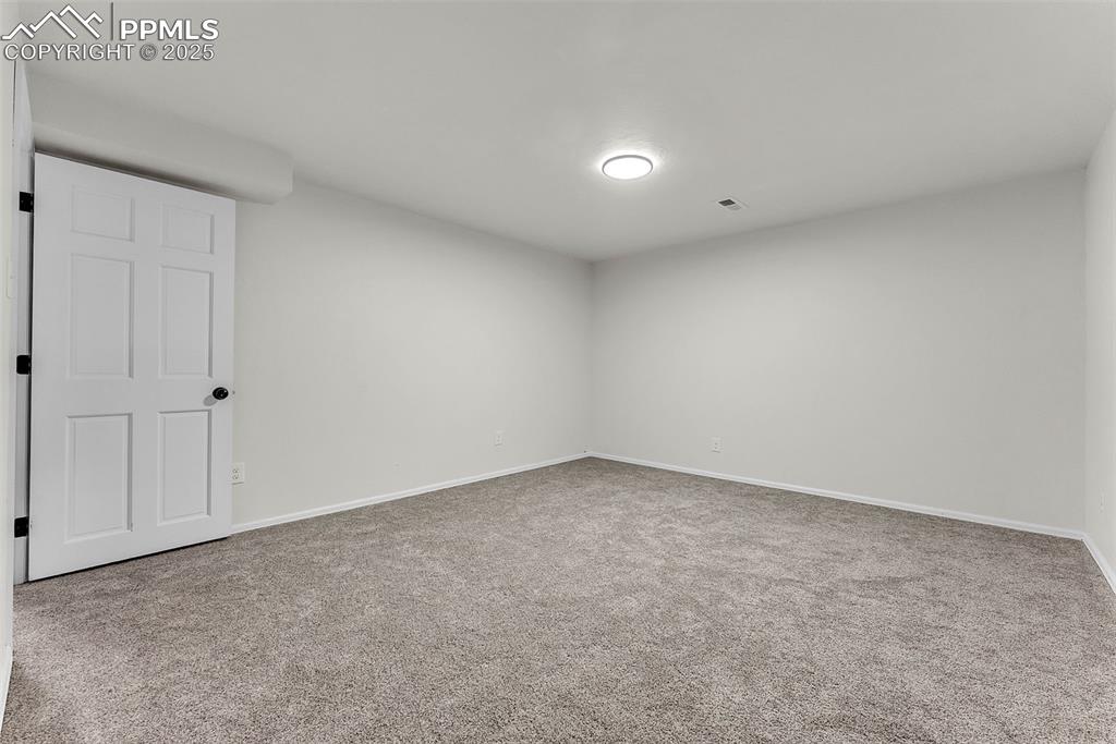 Image 24 of 38: Basement Level: Oversized Family Room / Flex Room ; Endless Possibilities t