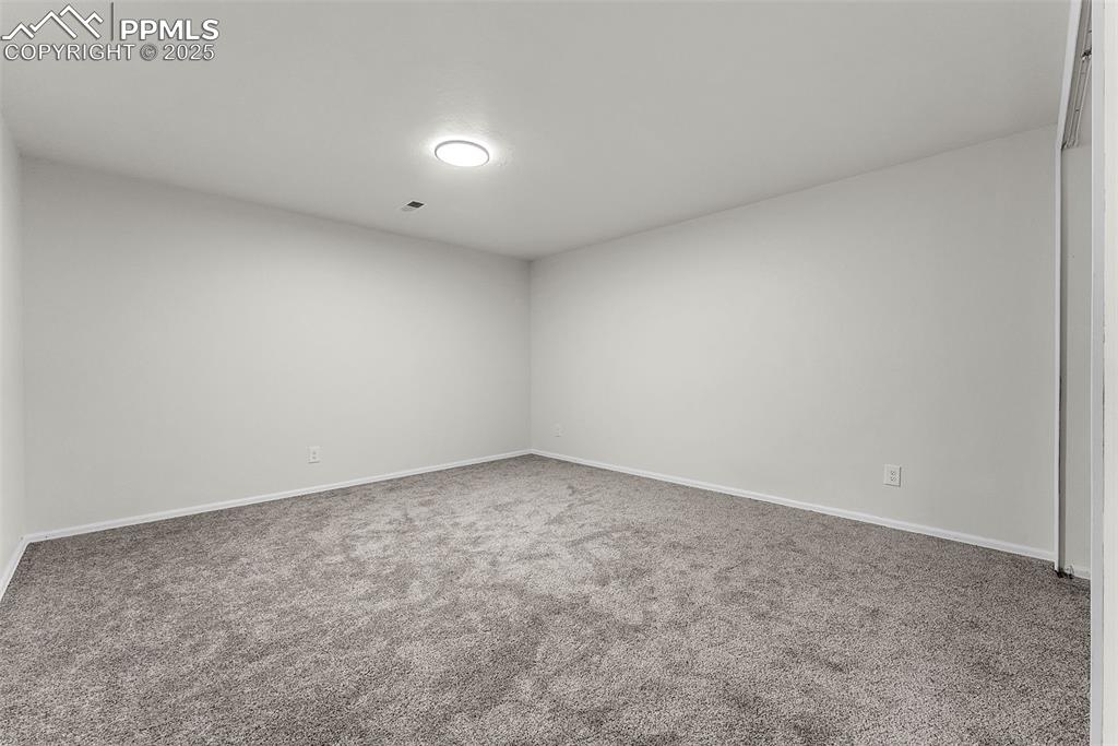 Image 28 of 38: Basement Level: Oversized Family Room / Flex Room ; Endless Possibilities t