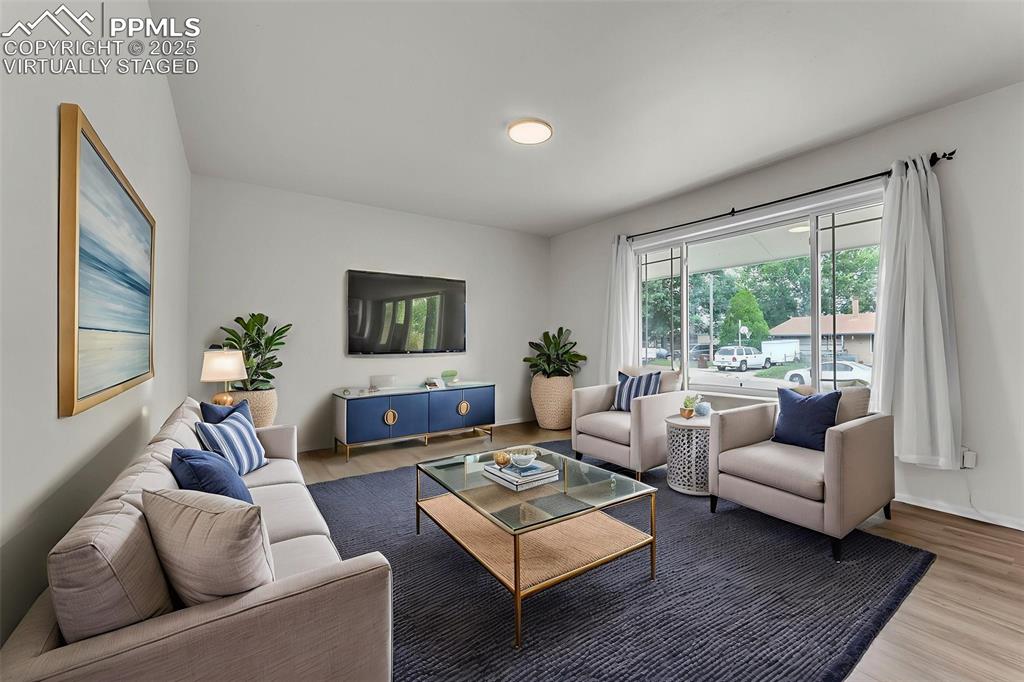 Image 3 of 38: Virtually Staged. Large and Bright Entry / Living Room