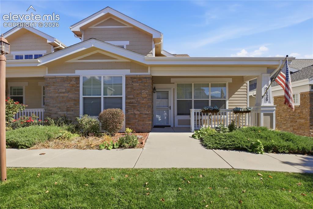 Image 1 of 27: Stone veneer and siding exterior with gabled roof lines