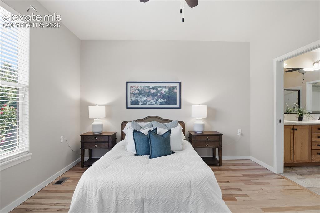 Image 14 of 27: Hardwood-style flooring throughout