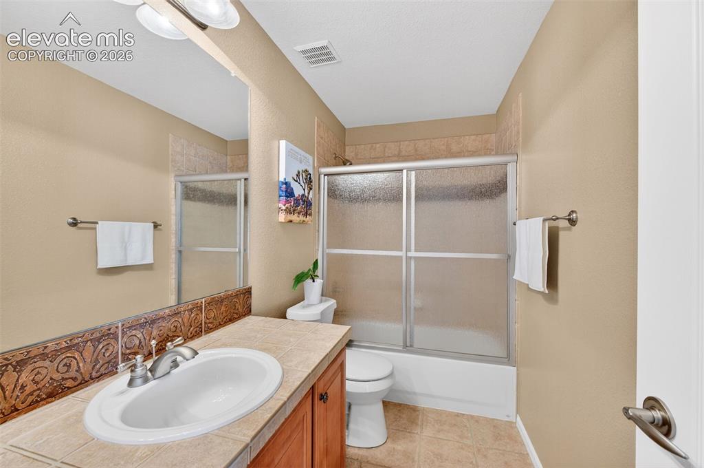 Image 32 of 49: Upstairs 2nd Bathroom