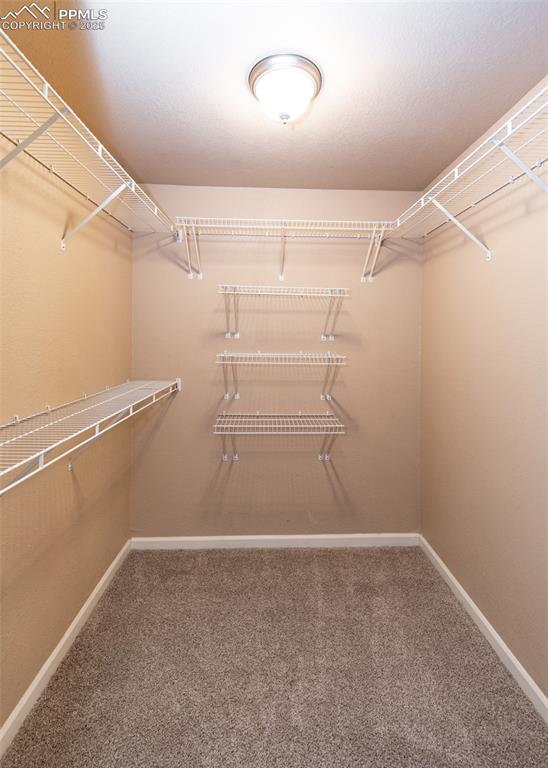 Image 37 of 45: Primary bedroom closet