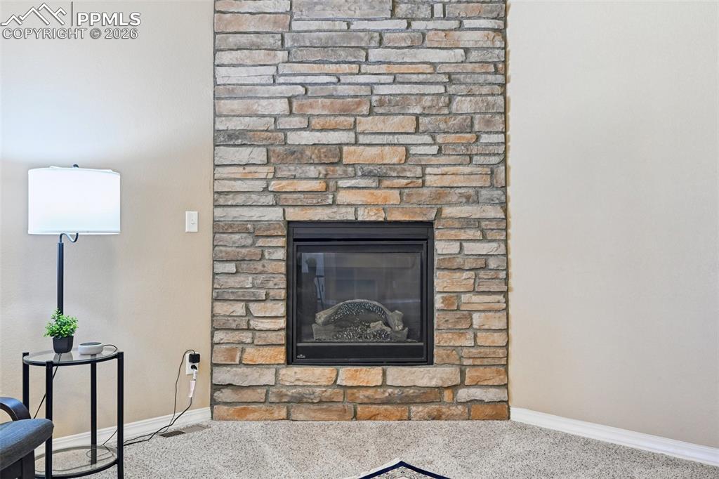 Image 11 of 41: Great Room fireplace