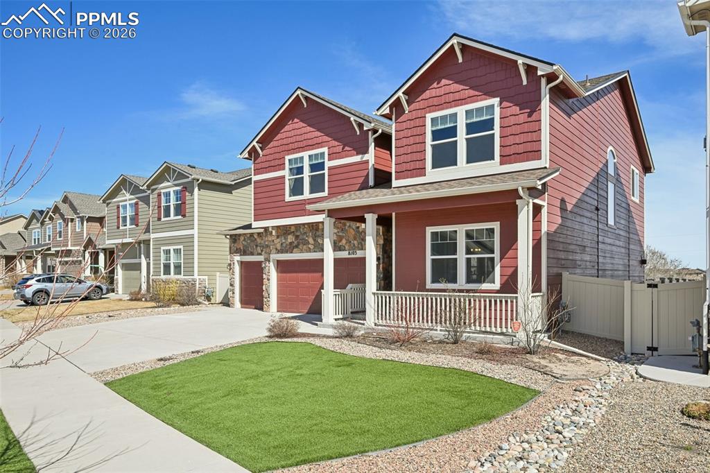 Image 2 of 41: Tons of curb appeal with stone accents