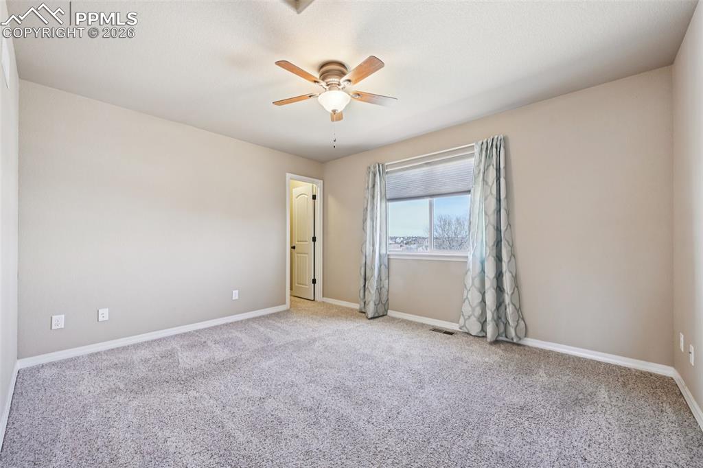 Image 26 of 41: Bedroom #2 upstairs with walk in closet