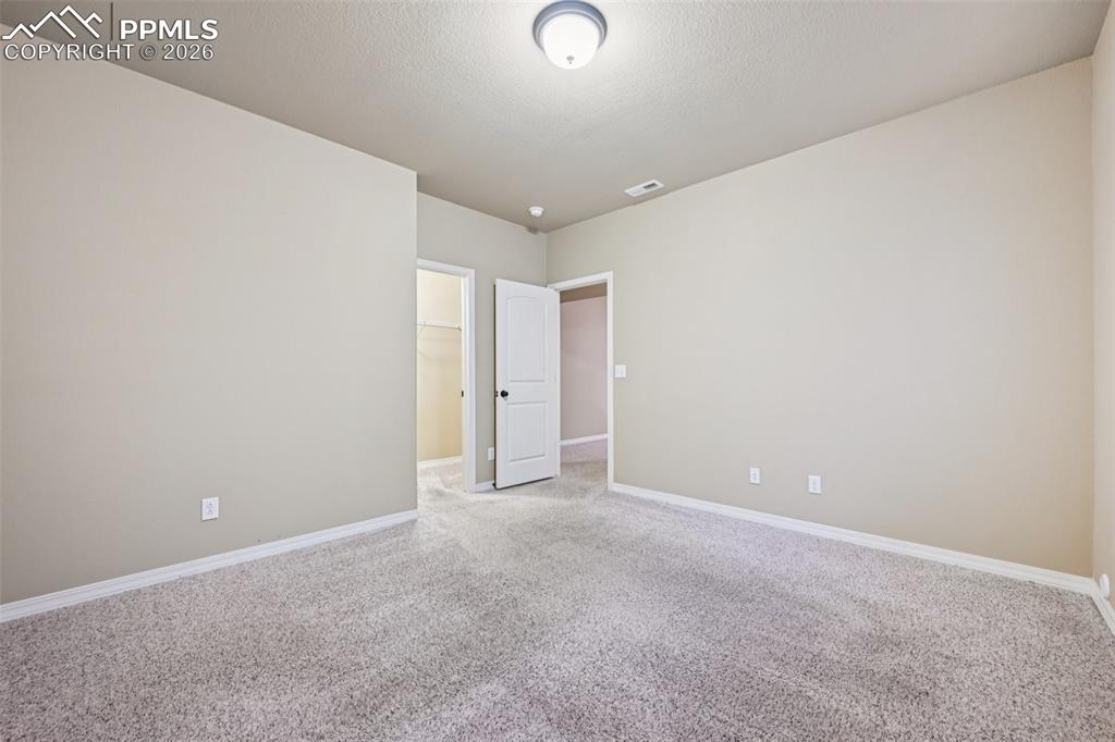 Image 32 of 41: Bedroom #4 is in the basement level