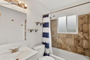 Image 14 of 26: Full bathroom on main level