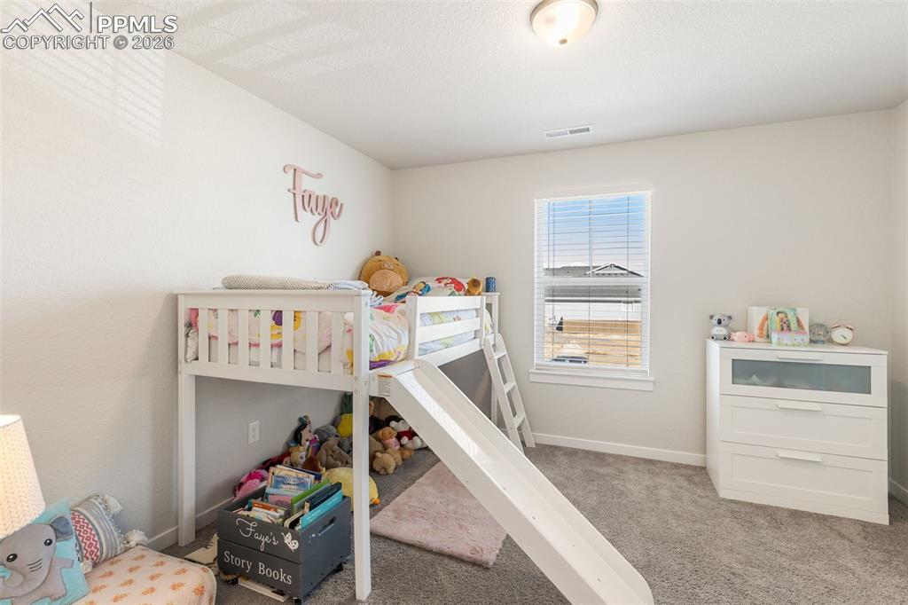 Image 22 of 38: Bedroom