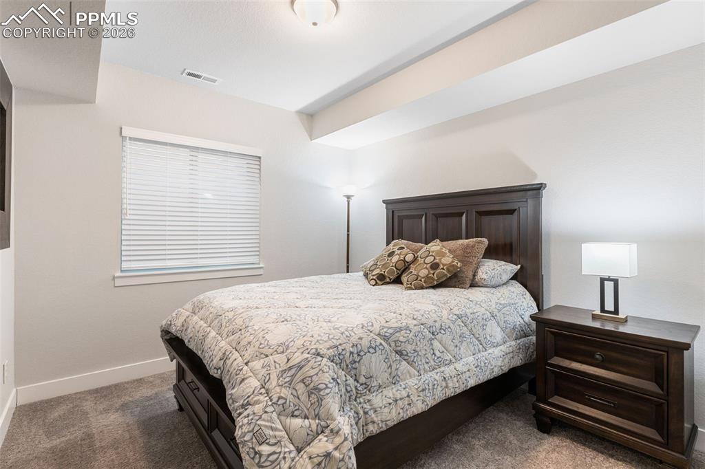 Image 29 of 38: Bedroom